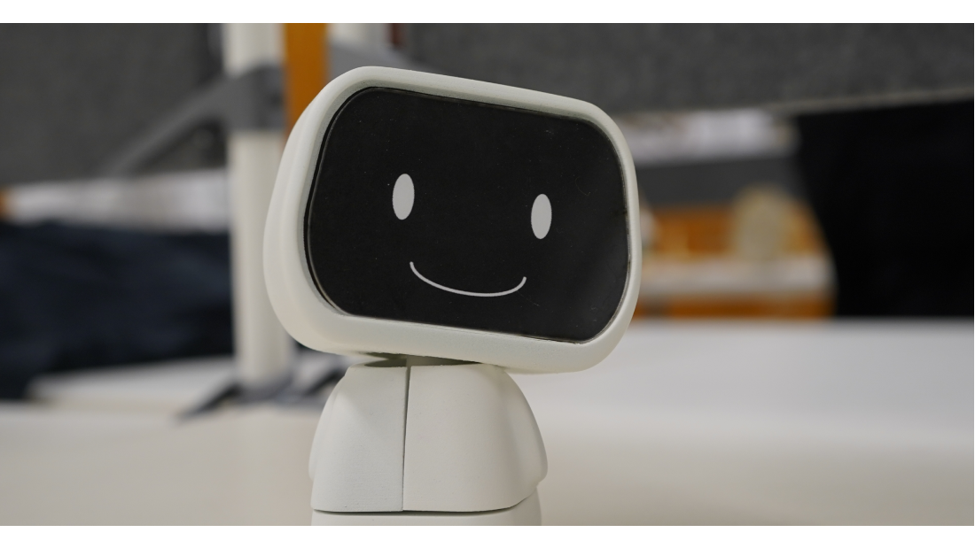 image of a little robot with a smiley face