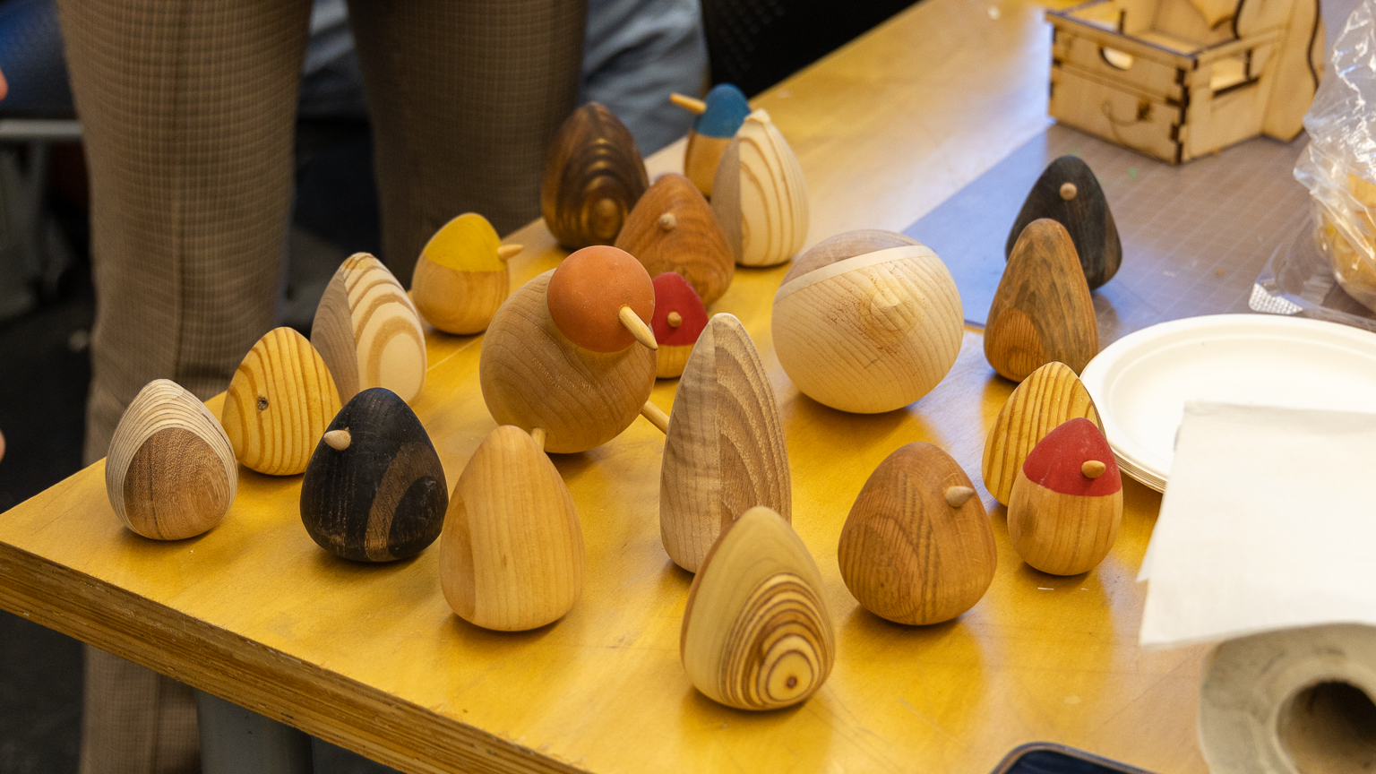Wooden birds and eggs in different sizes and colors