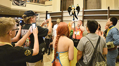 Attendees at Dragon Con take photos of 'Buzzra'